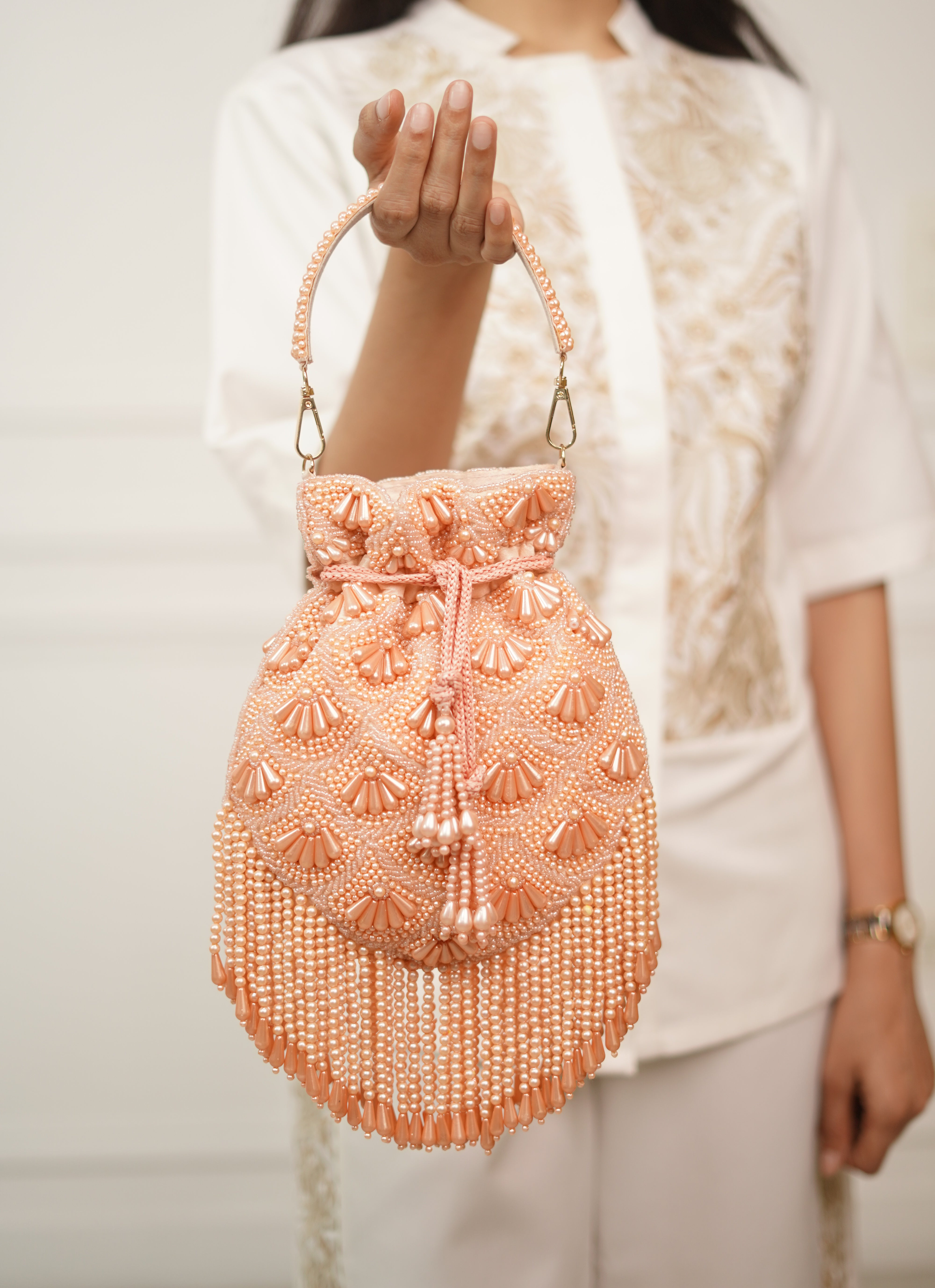 Gulnaar Peach Pearl Embellished Potli