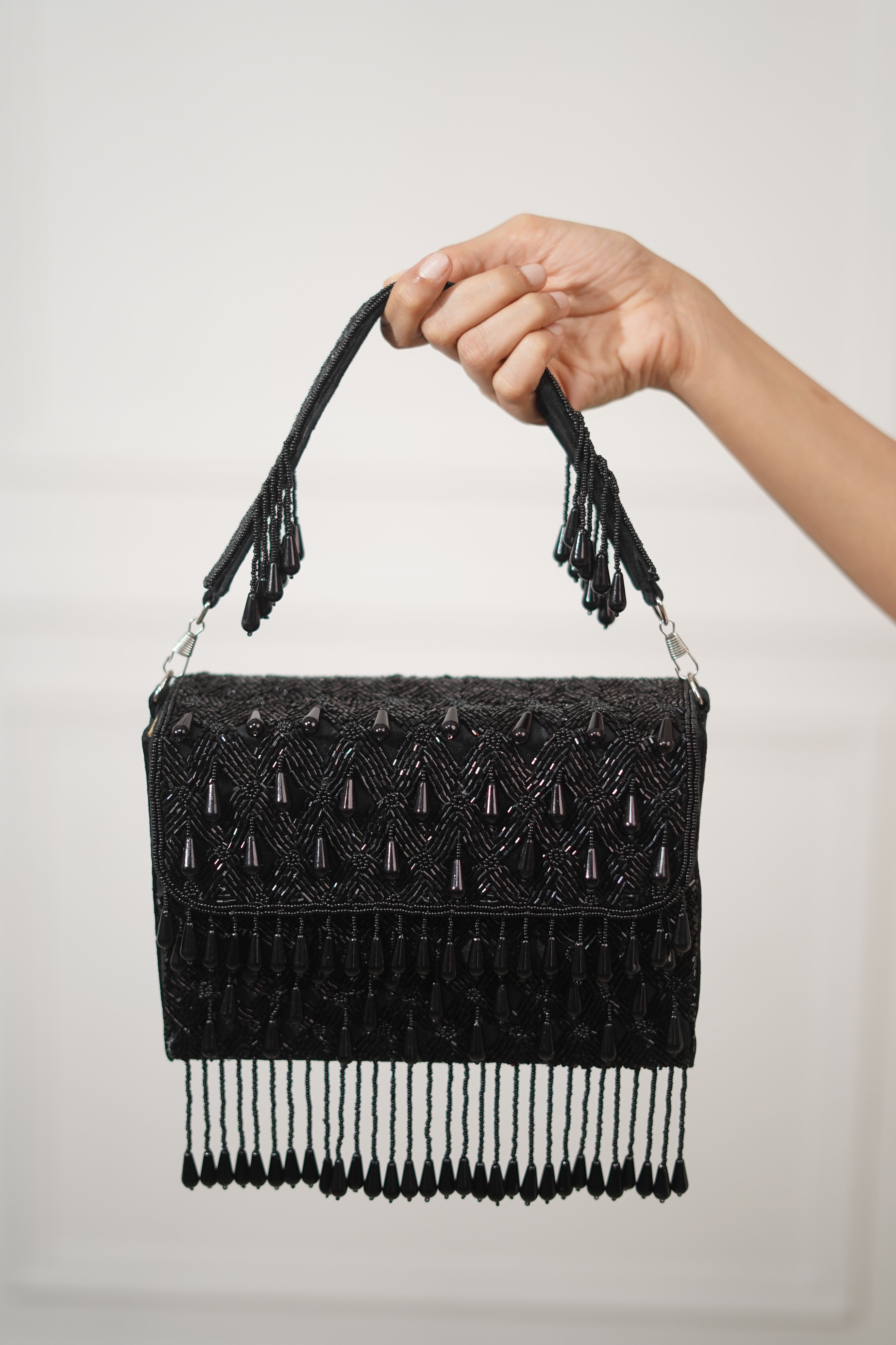 Raat Ki Rani Black Bead Embellished Bag with Tassels