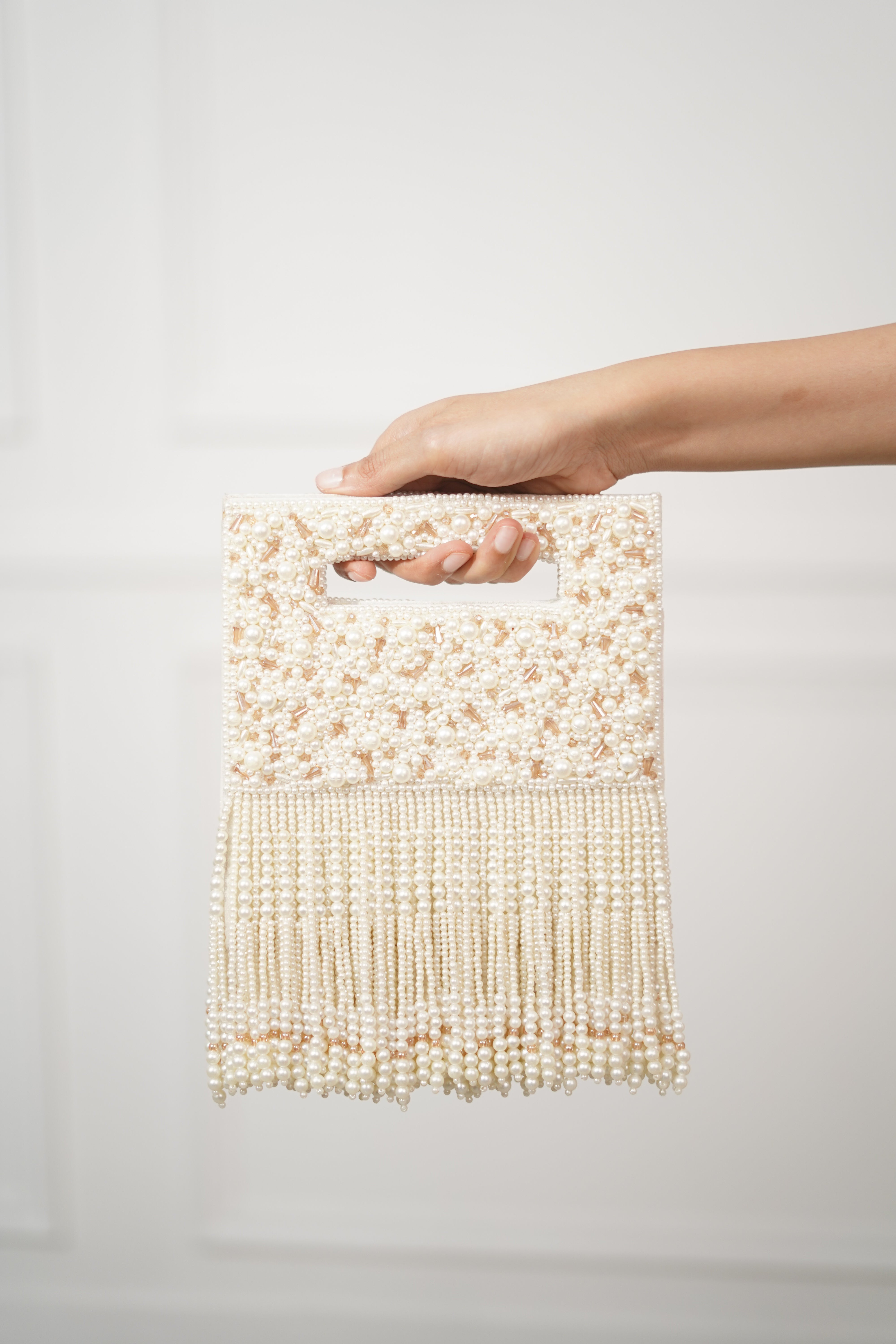 Shanaya Ivory Pearl Studded Handheld Clutch